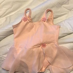 Danskin toddler pink bodysuit.